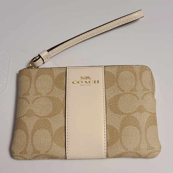 Coach Handbags - Coach Wristlet Corner Zip  In Signature Canvas